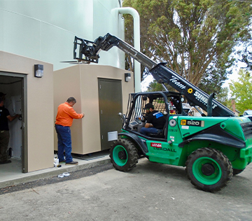 Dual DuraFiber buildings for water tower treatment